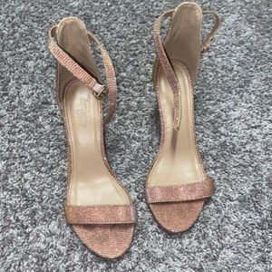 Shiny rose gold heels
